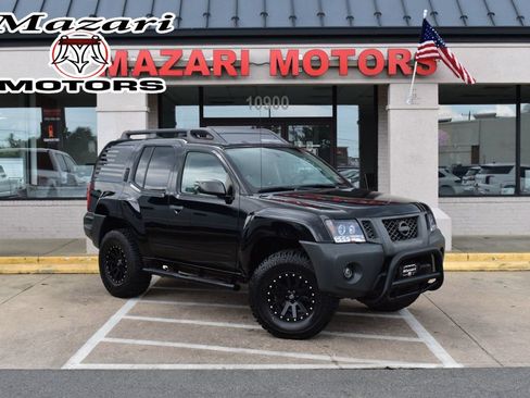 Used 2010 Nissan Xterra X AWD/4WD image 1