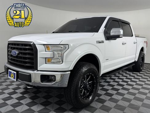 Used 2015 Ford F150 Lariat AWD/4WD image 1