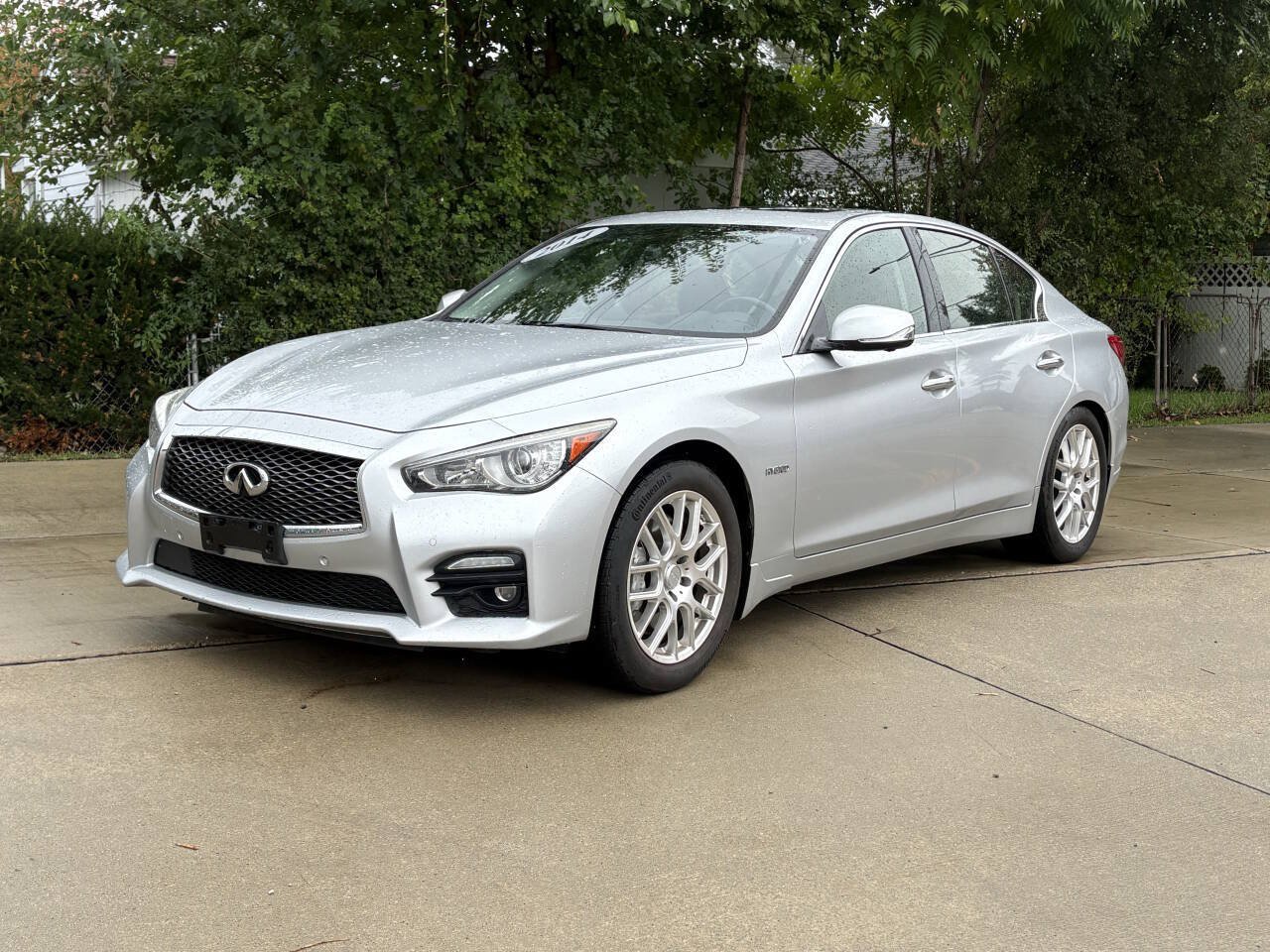 Used 2014 INFINITI Q50 Hybrid AWD w/ Deluxe Technology Package image 1