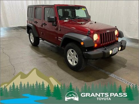 Used 2012 Jeep Wrangler Unlimited Sport AWD/4WD image 1