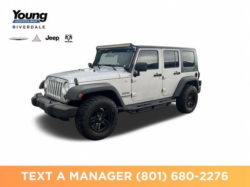 Used 2010 Jeep Wrangler Unlimited Sport AWD/4WD image 1