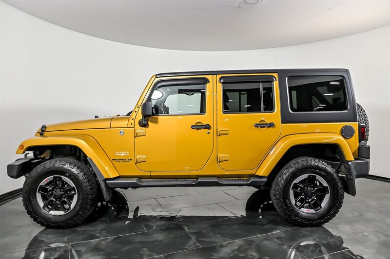 Used 2014 Jeep Wrangler Unlimited Sahara w/ Dual Top Group AWD/4WD image 6