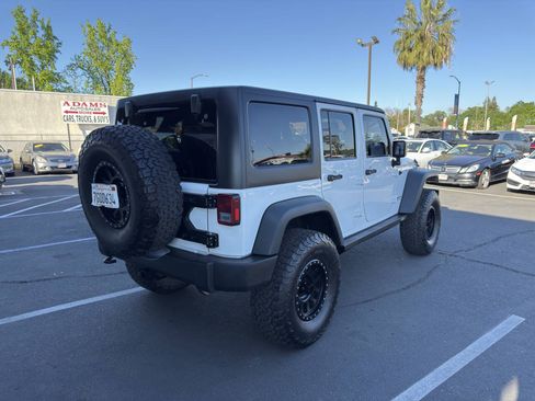 Used 2014 Jeep Wrangler Unlimited Rubicon w/ Connectivity Group AWD/4WD image 3
