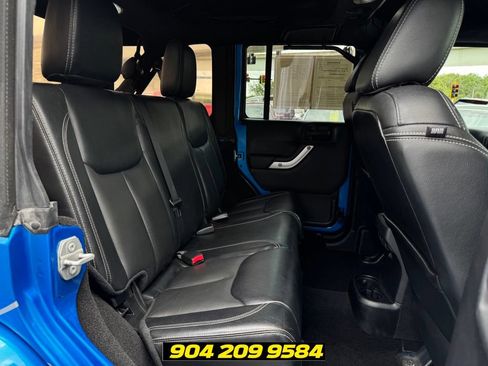 Used 2016 Jeep Wrangler Unlimited Sahara w/ Dual Top Group AWD/4WD image 29