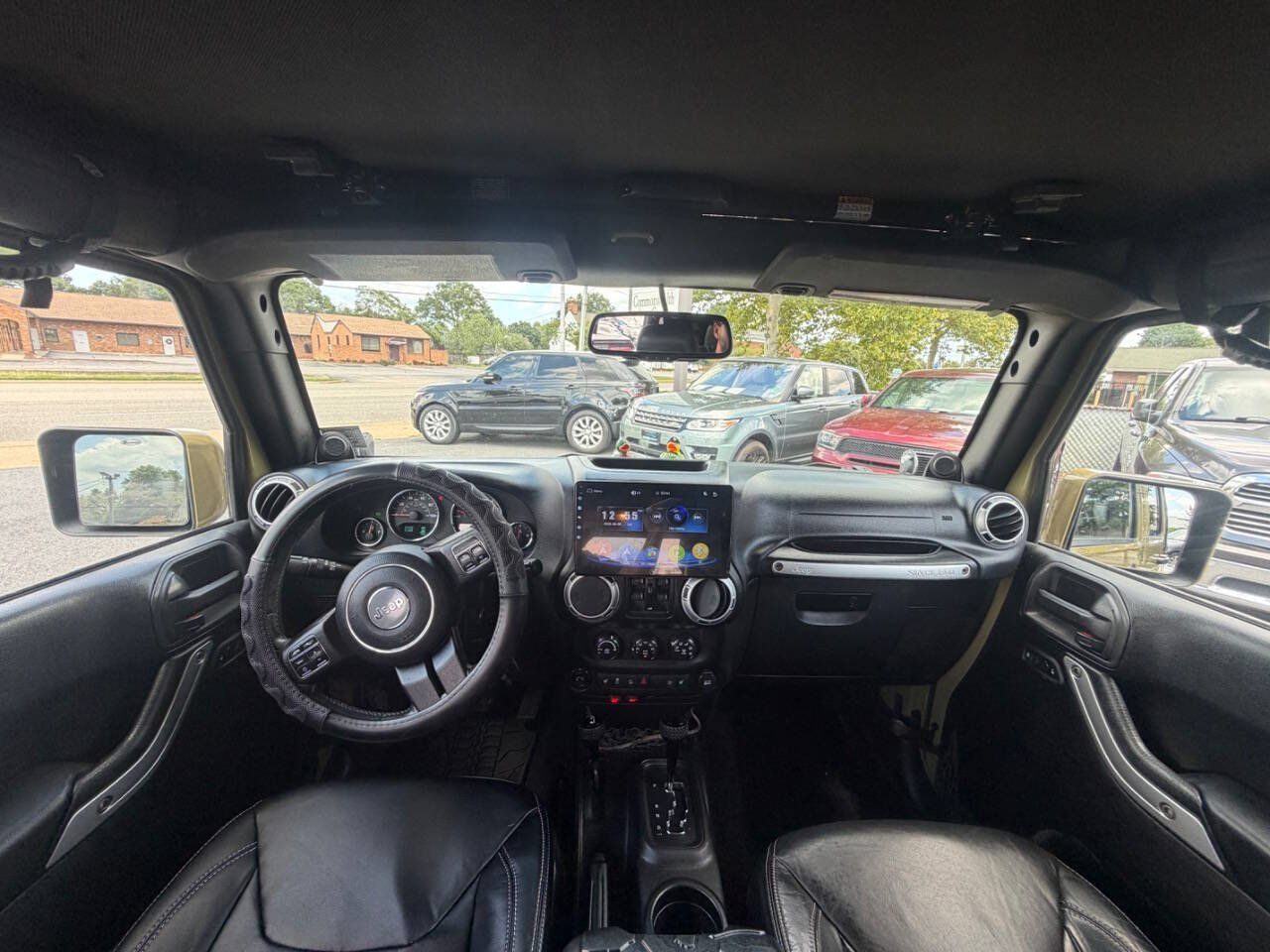 Used 2013 Jeep Wrangler Unlimited Sahara w/ Dual Top Group AWD/4WD image 8
