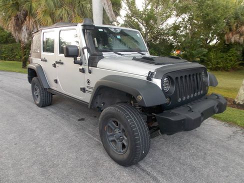 Used 2012 Jeep Wrangler Unlimited Sport AWD/4WD image 1