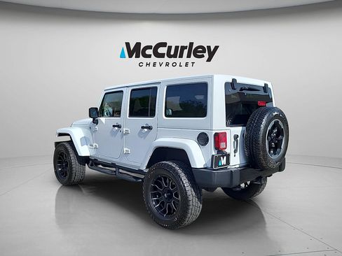 Used 2014 Jeep Wrangler Unlimited Sahara w/ Dual Top Group AWD/4WD image 5