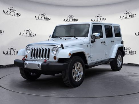 Used 2013 Jeep Wrangler Unlimited Sahara w/ Trailer Tow Group AWD/4WD image 3