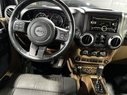 Used 2012 Jeep Wrangler Unlimited Sahara w/ Dual Top Group AWD/4WD image 24