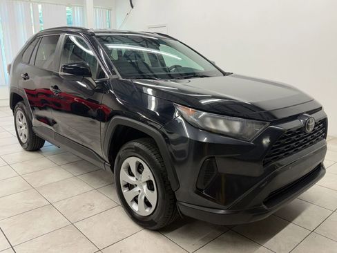 Used 2021 Toyota RAV4 LE w/ Carpet Mat Package (TMS) AWD/4WD image 1