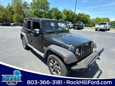 Used 2012 Jeep Wrangler Unlimited Sport AWD/4WD image 1