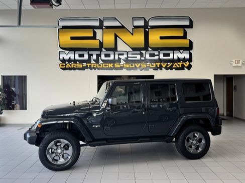 Used 2016 Jeep Wrangler Unlimited Sahara w/ Max Tow Package AWD/4WD image 4
