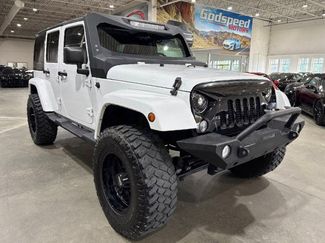 Used 2014 Jeep Wrangler Unlimited Sahara w/ Max Tow Package image 1