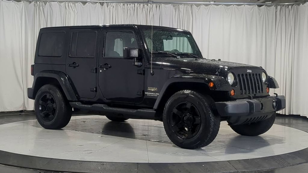 Used 2012 Jeep Wrangler Unlimited Sahara AWD/4WD image 3