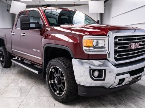 Used 2015 GMC Sierra 2500 SLT w/ Suspension Package, Off-Road AWD/4WD image 1