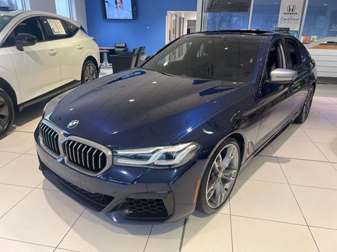 Used 2021 BMW M550i xDrive w/ Executive Package image 1