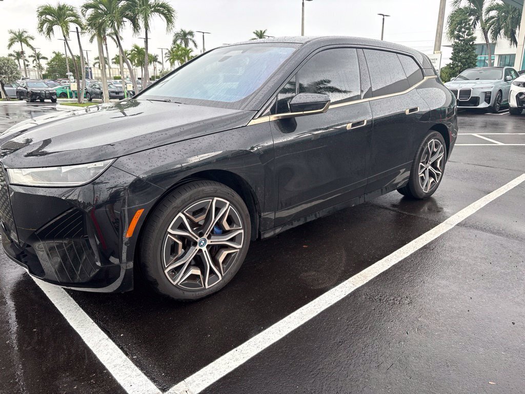 Used 2024 BMW iX xDrive50 w/ Sport Package AWD/4WD image 1