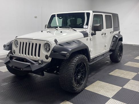 Used 2010 Jeep Wrangler Unlimited Sport AWD/4WD image 1