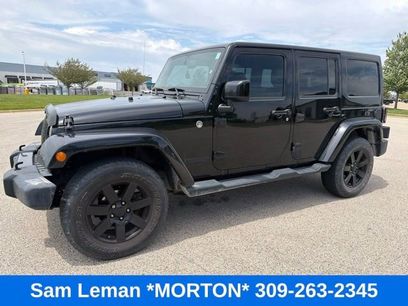 Used 2014 Jeep Wrangler Unlimited Sahara w/ Dual Top Group