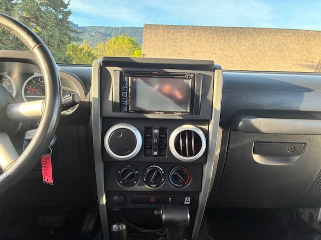 Used 2010 Jeep Wrangler Unlimited Sahara w/ Dual Top Group AWD/4WD image 14