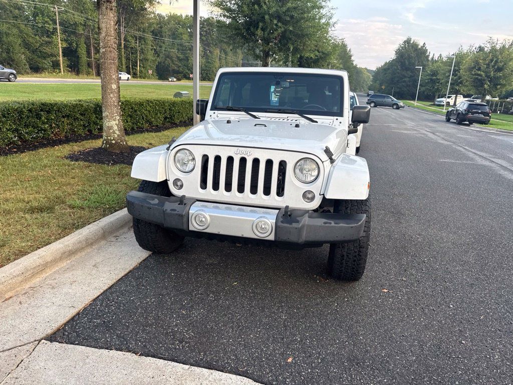 Used 2014 Jeep Wrangler Sahara w/ Connectivity Group AWD/4WD image 1