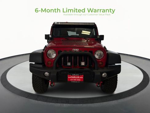 Used 2012 Jeep Wrangler Unlimited Rubicon w/ Dual Top Group AWD/4WD image 2