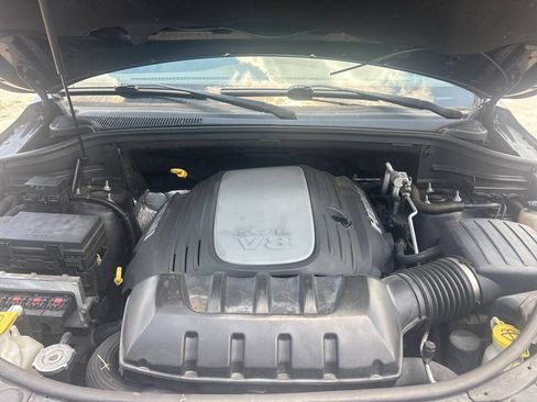 Used 2011 Jeep Grand Cherokee Laredo AWD/4WD image 1