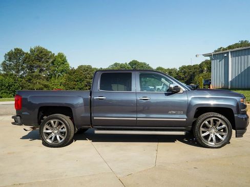 Used 2018 Chevrolet Silverado 1500 LTZ Z71 w/ Centennial Edition AWD/4WD image 3