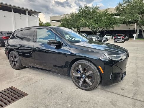 Used 2024 BMW iX xDrive50 w/ Premium Package AWD/4WD image 1