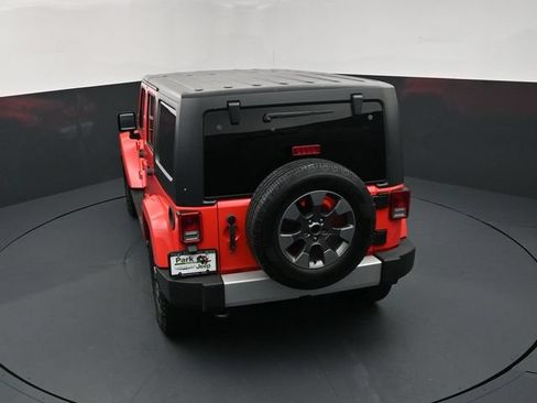 Used 2013 Jeep Wrangler Unlimited Sahara w/ Dual Top Group AWD/4WD image 16