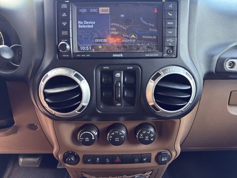 Used 2012 Jeep Wrangler Unlimited Sahara w/ Dual Top Group AWD/4WD image 8