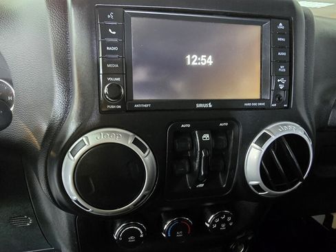 Used 2015 Jeep Wrangler Unlimited Sahara w/ Dual Top Group AWD/4WD image 22