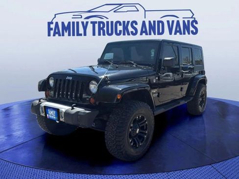 Used 2010 Jeep Wrangler Unlimited Sahara w/ Limited Group AWD/4WD image 1
