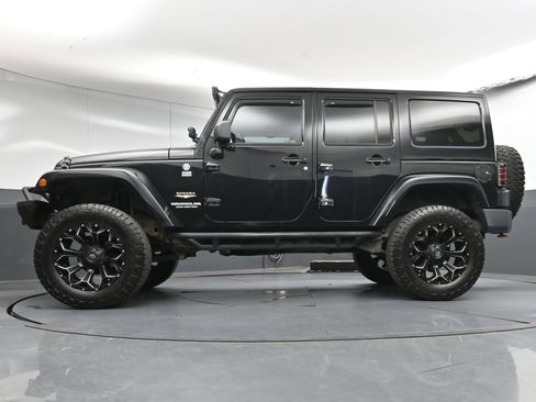 Used 2012 Jeep Wrangler Unlimited Sahara w/ Dual Top Group image 34