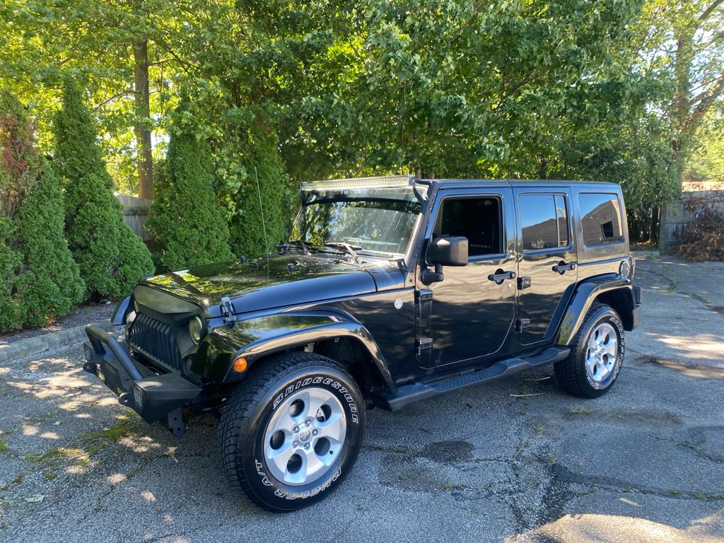 Used 2014 Jeep Wrangler Unlimited Sahara w/ Dual Top Group AWD/4WD image 1
