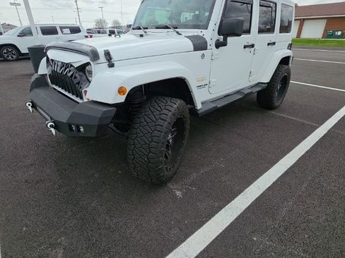 Used 2012 Jeep Wrangler Unlimited Sahara w/ Connectivity Group image 1