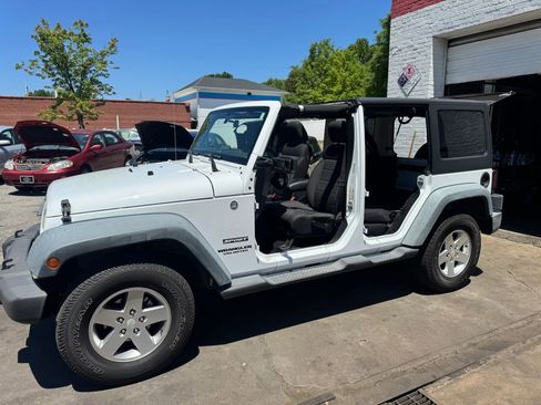 Used 2011 Jeep Wrangler Unlimited Sport AWD/4WD image 2