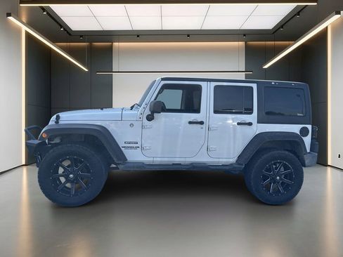 Used 2012 Jeep Wrangler Unlimited Sport AWD/4WD image 2