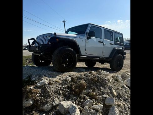 Used 2012 Jeep Wrangler Unlimited Sport image 1