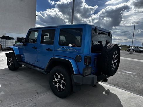 Used 2014 Jeep Wrangler Unlimited Sahara AWD/4WD image 3