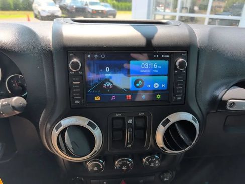 Used 2012 Jeep Wrangler Unlimited Sahara w/ Dual Top Group AWD/4WD image 3
