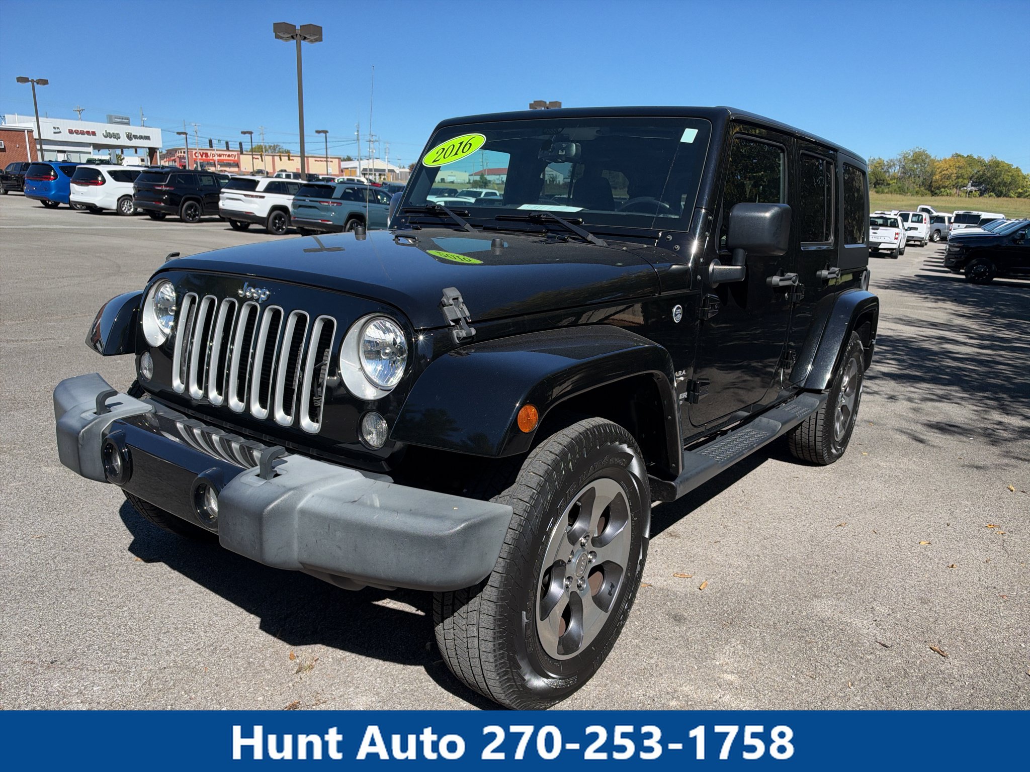 Used 2016 Jeep Wrangler Unlimited Sahara w/ Dual Top Group AWD/4WD image 1