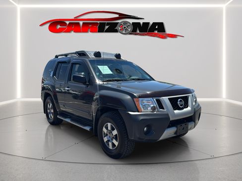 Used 2013 Nissan Xterra PRO-4X AWD/4WD image 1