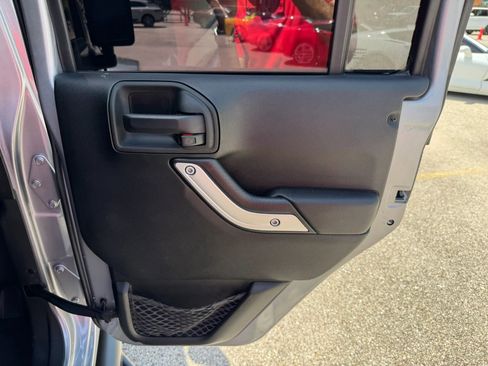 Used 2014 Jeep Wrangler Unlimited Sahara w/ Max Tow Package AWD/4WD image 31