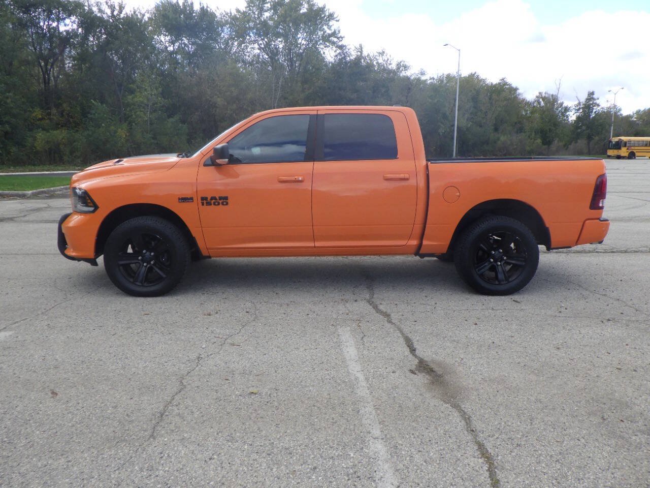 Used 2015 RAM 1500 Sport w/ Ignition Orange Sport Package AWD/4WD image 2
