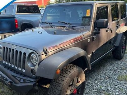 Used 2014 Jeep Wrangler Unlimited Rubicon w/ Dual Top Group