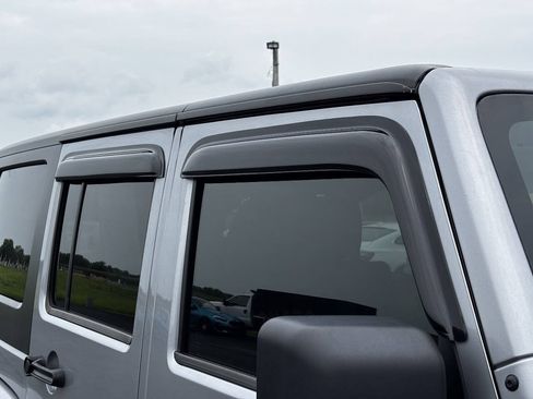Used 2014 Jeep Wrangler Unlimited Sahara w/ Dual Top Group AWD/4WD image 15