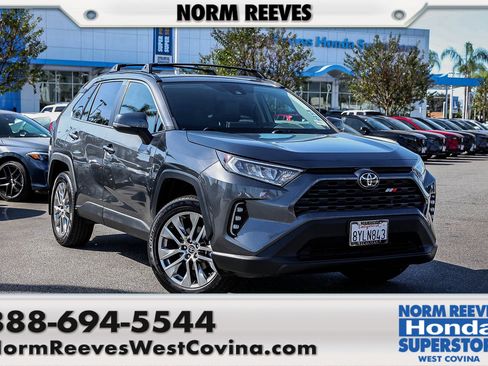 Used 2021 Toyota RAV4 XLE Premium w/ Carpet Mat Package (TMS) image 1