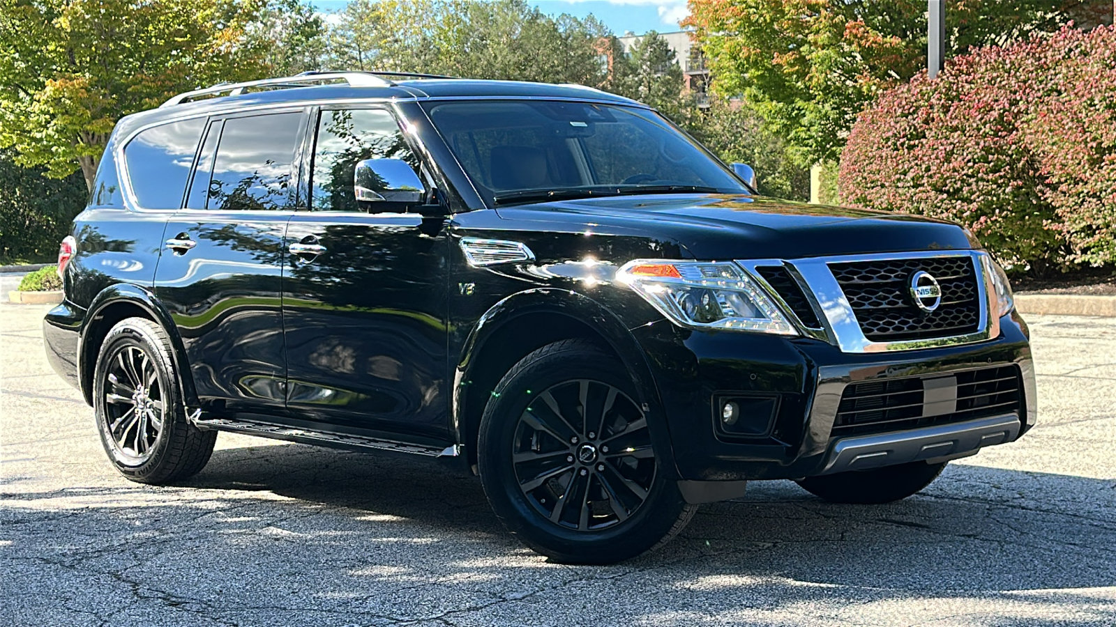 Certified 2019 Nissan Armada Platinum w/ Captain's Chairs Package AWD/4WD image 1