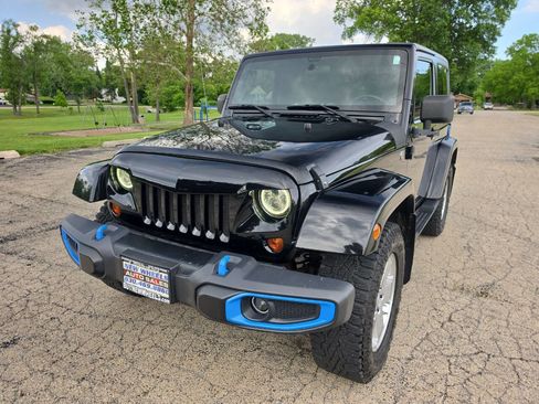 Used 2009 Jeep Wrangler Sahara w/ Dual Top Group AWD/4WD image 1